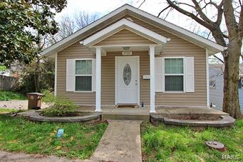 This home is well done and is close to University and Capaha Park.  It has two functional living areas.  One on main floor with a beautiful kitchen, great room/dining room and two bedrooms with baths.  As you walk out from kitchen on to deck, you have a large backyard with a great view.  The lower area is a walk-out basement with bedroom, bath, and a area that can be used as a efficiency kitchen area/small family room.  This home has many possibilities, a must see for anyone looking for a great value.  One could rent lower level and live in upper level.  Many possibilities.