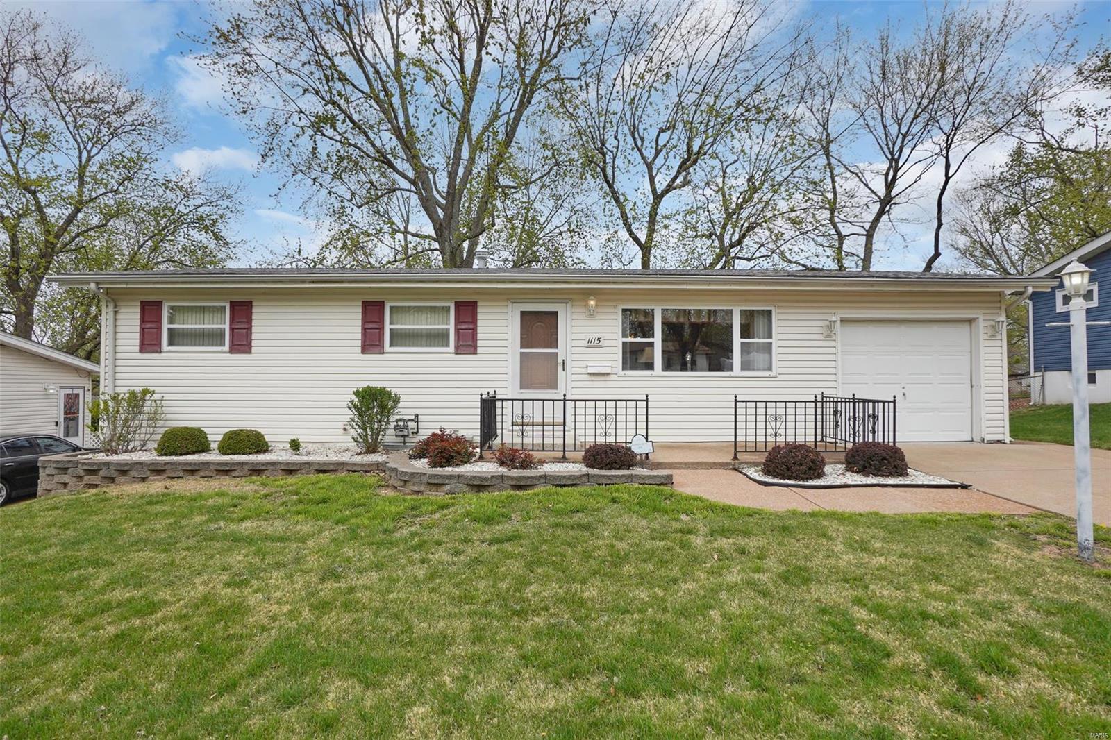 Meticulously cared for,well maintained 4 bedroom 1.5 bath home in McCluer North boundaries. Spacious living room lets in so much natural light with large picture window, and features a custom hand crafted built-in display cabinet.  This room flows into updated and open kitchen featuring LVP flooring, backsplash, double sink and cabinet lighting. This spacious area allows for an eat-in dining/kitchen experience perfect for entertaining.  Bedroom off kitchen can be your primary bedroom with 1/2 bath AND MF laundry, or utilize as a second living space, office, or flex room. Down center hallway, 3 generous size bedrooms with ample closet space and updated bathroom with walk-in shower featuring bench seating/grab bars complete main level.  Finished LL with large family rec room, and 2 additional sleeping rooms w/closets provides great space for all! Abundant storage w/ 2nd laundry hook-up. Enjoy your fenced back yard with a great patio, and beautiful mature trees. New roof in 2024!