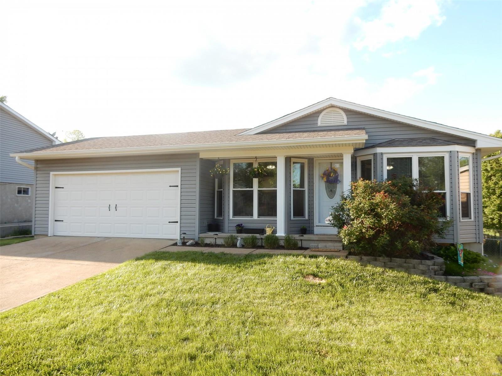 Updated modern ranch, in a popular neighborhood, minutes from shopping and highway access. This home boast 4 bedrooms, and 2.5 baths, with a large level fenced yard, and a deck. The exterior has been recently updated with maintenance free siding, enclosed soffit, fascia, and a new welcoming glass steel entry door. Newer architectural roof, newer double-hung windows, hardwood floors throughout the main level. Neutral color scheme, newer carpet on the lower level. Kitchen has granite counter tops, newer stainless steel appliances. Bay windows in both living room, and dining room. Lower level has a family/recreational room, and a spacious second master suite, with a walk-in organizer closet. Also a full master bathroom featuring a walk in shower, and jetted tub.