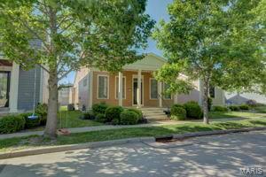 You will love everything about this home, from the inviting front porch to the back patio that’s great for entertaining and the tree lined streets of New Town. Walk-in and notice the new laminate floor that flows from the entry into the kitchen, breakfast room, bedrooms and the laundry room.  Get cozy by the fireplace in the living room while family and friends enjoy the huge rec room in the lower level.  A master suite with adult height vanity, 2 other good size bedrooms and 2 car garage complete this home. Other features include new water heater, kitchen with stainless steel appliances, 42” cabinets and breakfast bar, main floor laundry and 2nd egress in lower level. MAKE THIS YOUR PLACE TO CALL HOME AND ENJOY ALL NEW TOWN AMENITIES.