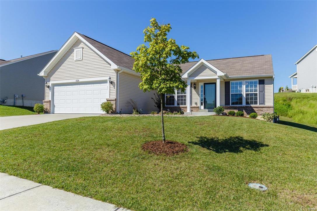 Price improvement! OPEN SUNDAY 10/23 12-3 CHECK OUT THIS 2 YEARS YOUNG Meticulously maintained Great Room Ranch located just off Wentzville Parkway minutes from HWY 40/61 & HWY 70. Sharp looking elevation & beautiful landscaping invites you to this Split bedroom ranch featuring great room, focal point wdburning fireplace w/ upgraded marble surround, built in surround sound system, Separate dining room, Open kitchen enhanced w/ stainless steel smooth top stove & built in microwave, pantry, breakfast bar, open to breakfast room w/ bay that leads to large back patio & private yard, master suite, luxury bath w/ linen closet, extended walk in shower, large 9x8 walk in closet, secondary bedrooms w/ double closets, Fully finished Lower Level with an additional 1200+ square feet of living space w/ Huge 46x12 family room wired for surround sound, 2 spacious bedrooms (w/ egress window) & a full bath, lots of upgrades incl; tons of canned lighting, overhead lighting & ceiling fans, crown molding.