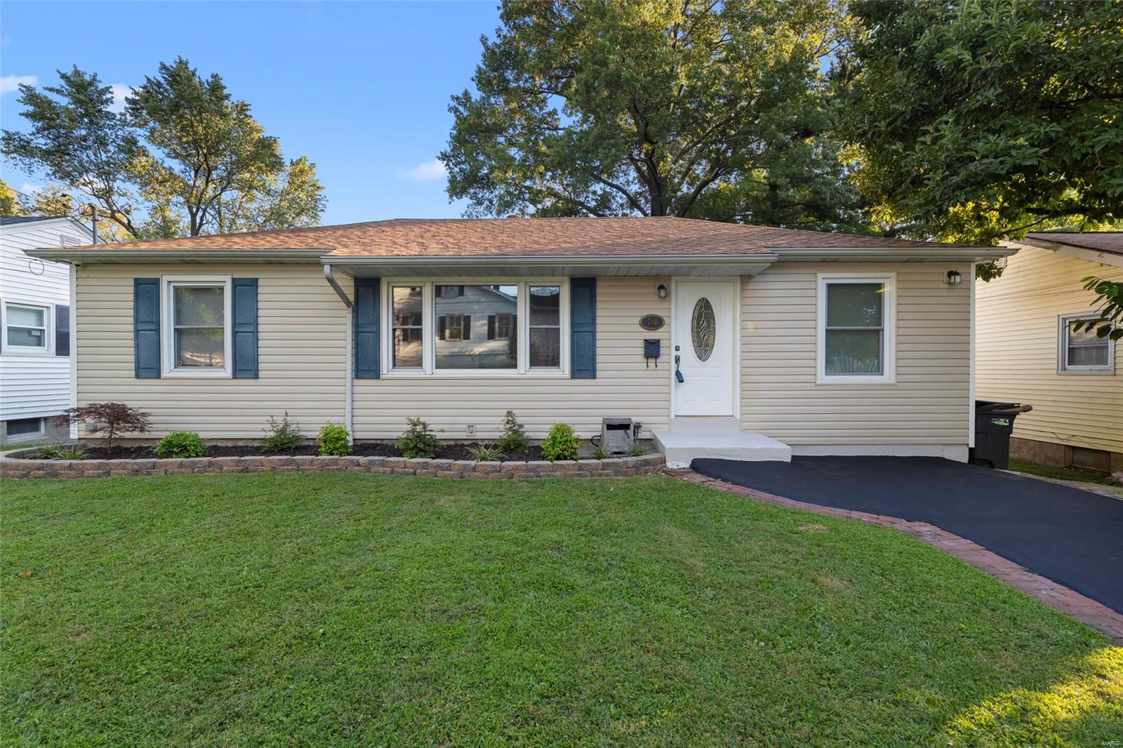 This ranch located in the Heart of Historic Old Town Florissant is loaded with additional features and updates ready for the virtual age of 2020.   At one end of the home you'll find 2 generously sized bedrooms with new carpeting, oversized closets with pre-installed closet organization systems.  At the other end is the master bedroom with built-in 5.1 surround sound speakers, electric fireplace, VAULTED CEILING with tray lighting, and a large WALK-IN CLOSET.  Kitchen has tile floors, additional counter top space, and a refrigerator that stays with the home.   Outdoor entertainment is made easy with the large 18’x26’ DECK with built-in outdoor speakers, and a 12’x18’ shed at the back of the lot.  The home comes with a pre-wired LAN wireless WI FI network. There are 3 outdoor HD network security cameras connected to a network video recorder, all which stay with the home for the next owner.  ROOF (2020) Bedroom Carpeting (2020) 50 Gallon WATER HEATER (2020) Landscaping (2020) DECK (2018)