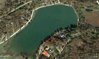 Lake front lot on lake Lock Loma. Great location to build a relaxing cabin or forever home.