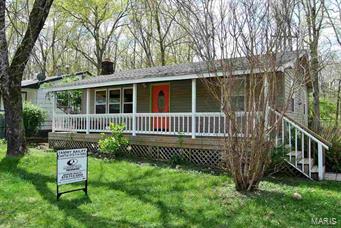 Looking for a starter home or a summer retreat? This 3 bedroom, 1.75 bath home is conveniently located in south Van Buren. A sizeable covered front porch, cozy back deck and a 1 car detached garage compliment this property. Just minutes from beautiful Current River or Big Springs Park.