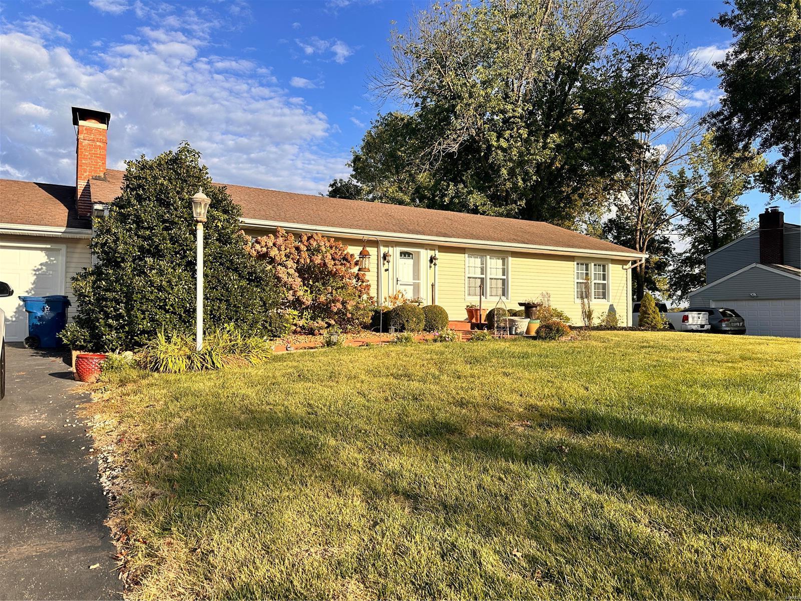 This 3-bedroom, 1.5-bath ranch in the heart of Manchester. The property is set on a large, level lot, offering plenty of outdoor space for play and relaxation.  The inviting living areas include a living room with wood burning fireplace, kitchen  that makes meal prep a breeze,  a dining room/ family room combo, and easy access to the screened porch, which is perfect for enjoying views of the lush backyard while having your morning coffee.  The finished lower level features a versatile rec room that is ideal for a playroom, home theater, or office space. Additional Rooms: Sun Room