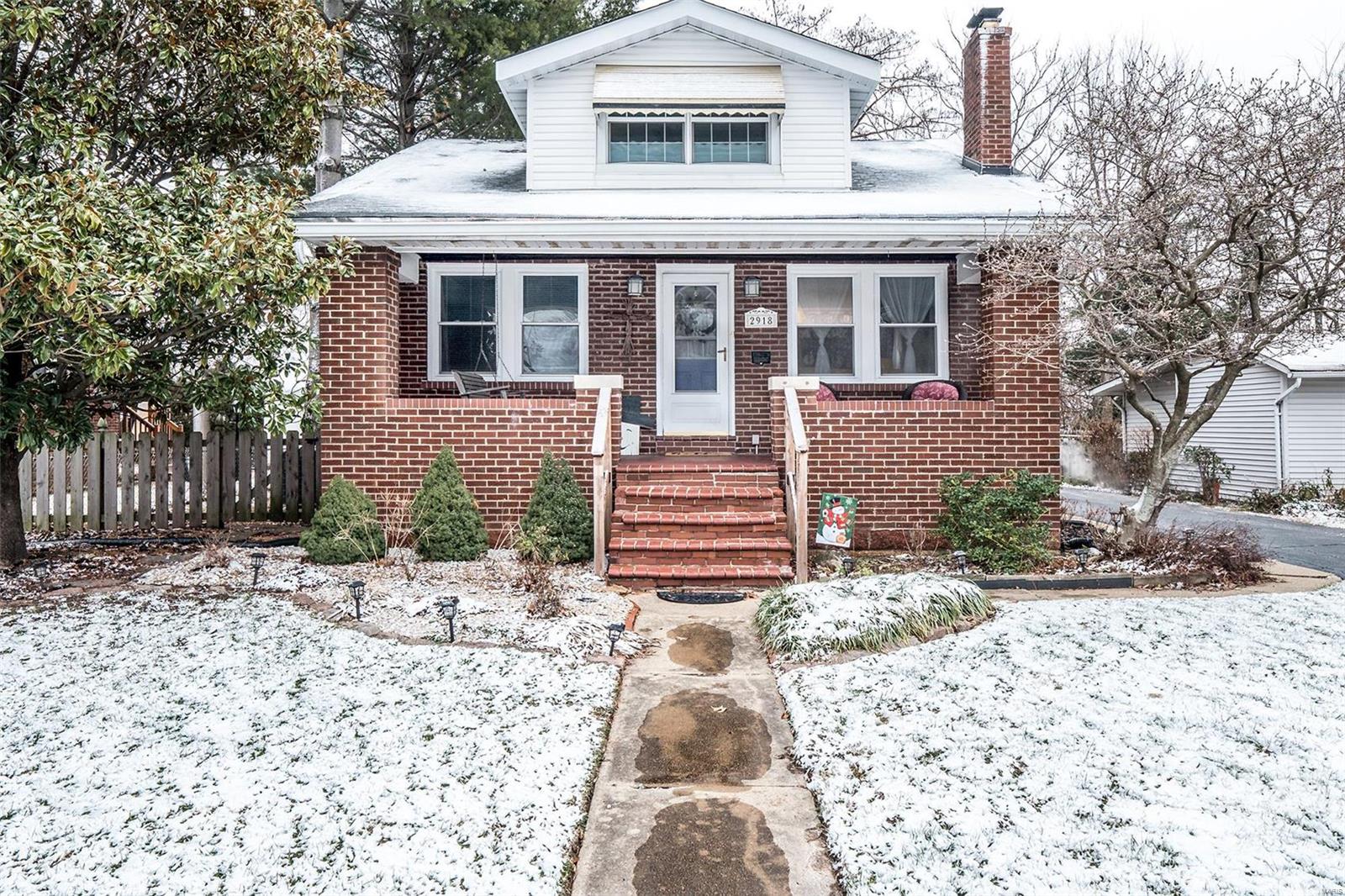 You will be blown away from the minute you walk in the front door. Begin in the living room with big picture window, hardwood flooring and brick fireplace. That leads to the dining room with hardwood flooring also. The kitchen is magnificent, it's been completely updated. Beautiful cabinetry, slate colored countertops, newer appliances and the breakfast bar stays. The master bedroom has been reconfigured to allow for more closet space. The main floor bath has been completely remodeled. The other room on the main floor is being used as an office. Upstairs there is a loft and 2 more bedrooms with newer carpet, and knotty pine walls. The basement..oh my goodness, a darling rec room with newer carpet and beautiful wood bar area & sink with vinyl flooring. There is an additional bedroom with built in drawers in the wall and a half bath. Both the front and back porches are covered, and the yard is amazingly big with a great swingset and is completely fenced. The driveway fits multiple cars!