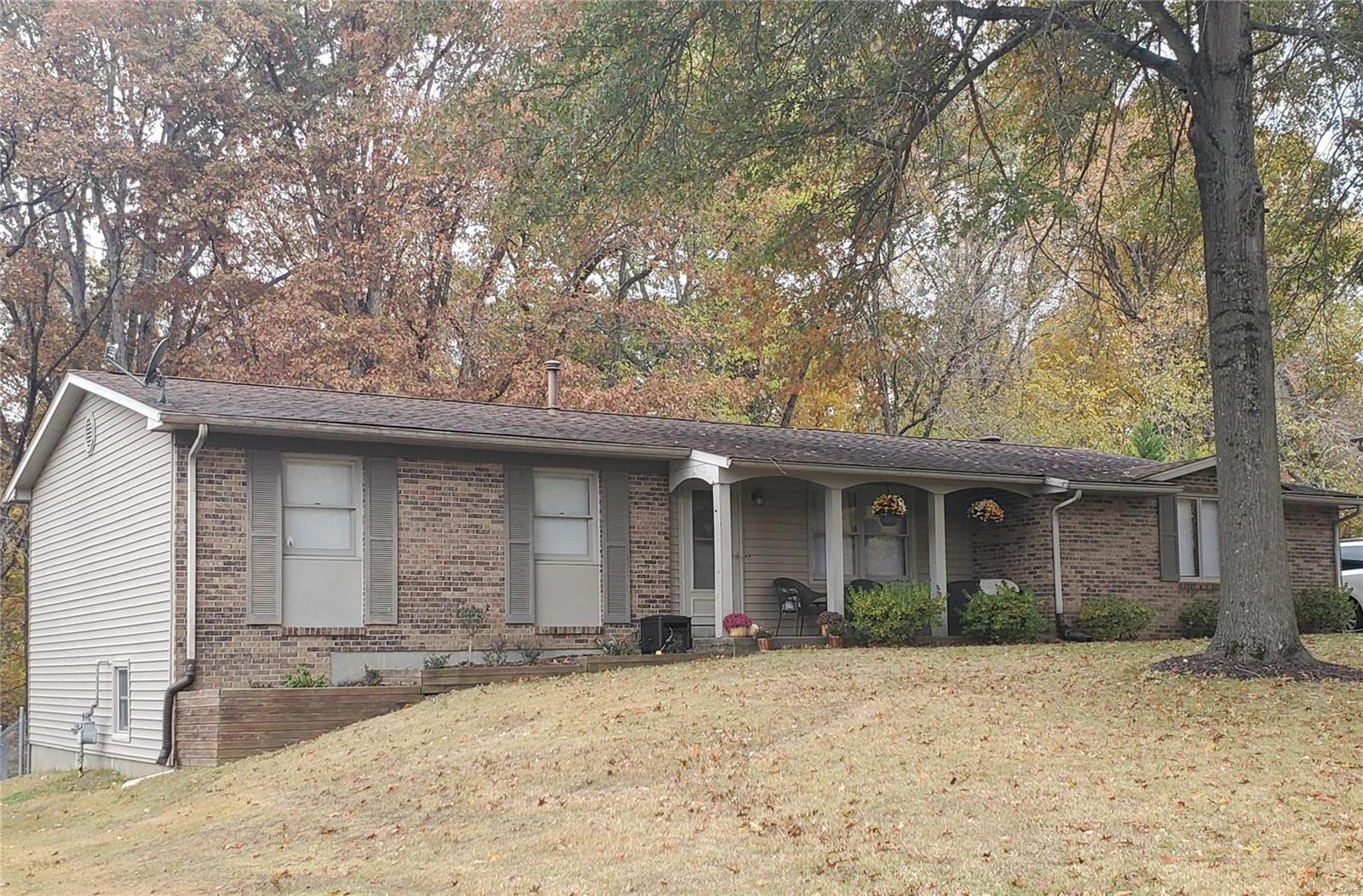 Adorable home on nearly a half an acre just outside of city limits and in a subdivision that features lake access. Backing up to woods, you'll love watching deer run by from the large deck. The inside is cute as a button and the hearth room is the perfect place to gather with friends or family.