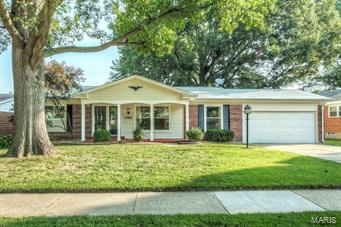 Don't let this one pass you by! Nice quiet tree lined street, newer windows & storm doors. Large 2 car garage with openers that enters into the kitchen. Spacious living & dining room area. Hardwood floors have been beautifully refinished in all 3 bedrooms. With two full baths on main floor, including an on suite master. Family room with newer carpet ceiling fan & new exterior door leading to patio area & large fenced yard. Kitchen was recently remodeled with 42 in cabinet’s,  stainless  steel appliances & new flooring. Wait till you see the basement. Completely finished  with finished ceilings & can lights. Large living areas on both sides of stairs, Full bath with shower, & large separate bonus room with walk in closet. Large Furnace/Laundry/Storage room allows for plenty of organized storage. This home has been updated over the past few years & very well maintained. Public transportation, shopping & entertainment, are just minutes away, including a park right around the corner.