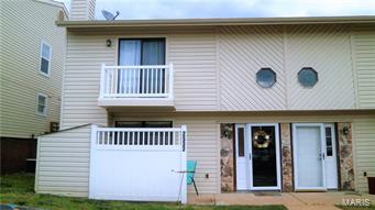 This Condo/Townhouse is Move in Ready! Enter through your own private entrance. Main floor has a huge living room with wood burning fireplace and beautiful mantel. The dining area has a garden window and newer kitchen flooring. Tons of storage in the kitchen with dishwasher, disposal, fridge, newer electric cooktop range. Main floor laundry and new HVAC system (5/15). The upstairs has a large Master bedroom with HIS & HERS CLOSETS & walk-out deck. The second bedroom offers spacious living space and a walk-in closet. Spacious bath on upper level. Condo includes 2 reserved parking spaces, utilities are cheap and on a cul-de-sac. The private patio and storage locker are great for relaxing on the patio furniture & grill. The Fox School Dist is a special bonus as well as being centered between Fenton & Arnold Shopping areas, restaurants, movie theaters, libraries and more. NO PETS! NO SMOKING. Rental application upon request.  $55 per applicant credit check