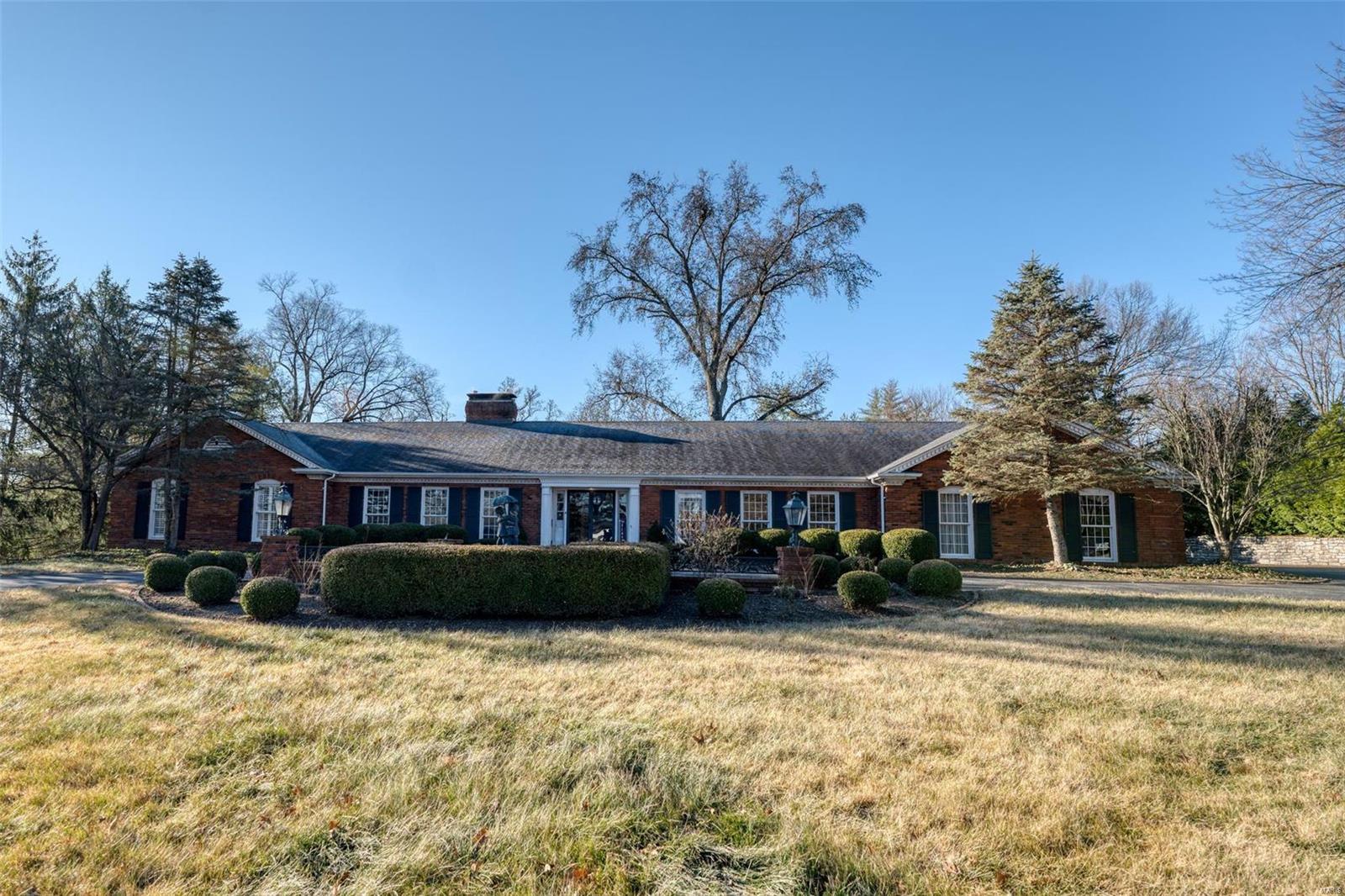 This is your opportunity to live in this Higginbotham built, all brick ranch home on 1.4 park-like private acres in prestigious Bellerive Country Club Grounds in Town & Country. The large open foyer welcomes you into this spacious ranch offering 3,425 sq ft of living space and 3-car garage. Solid hardwood floors in dining, living and family rooms, spacious kitchen with loads of opportunity and more!  The spacious FR w/ wet bar & brick floor to ceiling wood burning fireplace is the perfect spot for entertaining. There are 4  bedrooms including the master suite with large walk-in closets. The lower level offers a 2nd family room, sitting room and another full bath. Two staircases to access the lower level, one through garage and other on main level. The private, yard with ample room for a pool. Property is being sold AS IS and seller is offering a Home Warranty with the property. Set your tour today. (before and after rendering ideas coming soon).