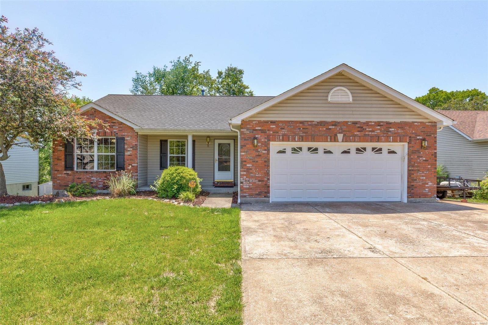 This home is situated on one of the most desirable lots in Williamsburg. Conveniently located near Crystal City Park where you can enjoy swimming, the playground and not to mention summer concerts. Hardwood flooring in the great room along with a gas fireplace. The kitchen includes raised panel cabinets and breakfast bar. The breakfast room offers glass doors leading to covered deck. Luxury primary suite hosts walk-in closet and full bath. The open staircase leads you to the finished lower level showcasing a spacious family room, deal for entertaining, along with a half bath.  Still plenty of storage available in the unfinished areas. The walk out basement leads to a covered patio and fenced-in yard. Excellent location! Crystal City Schools. This is a one owner home.