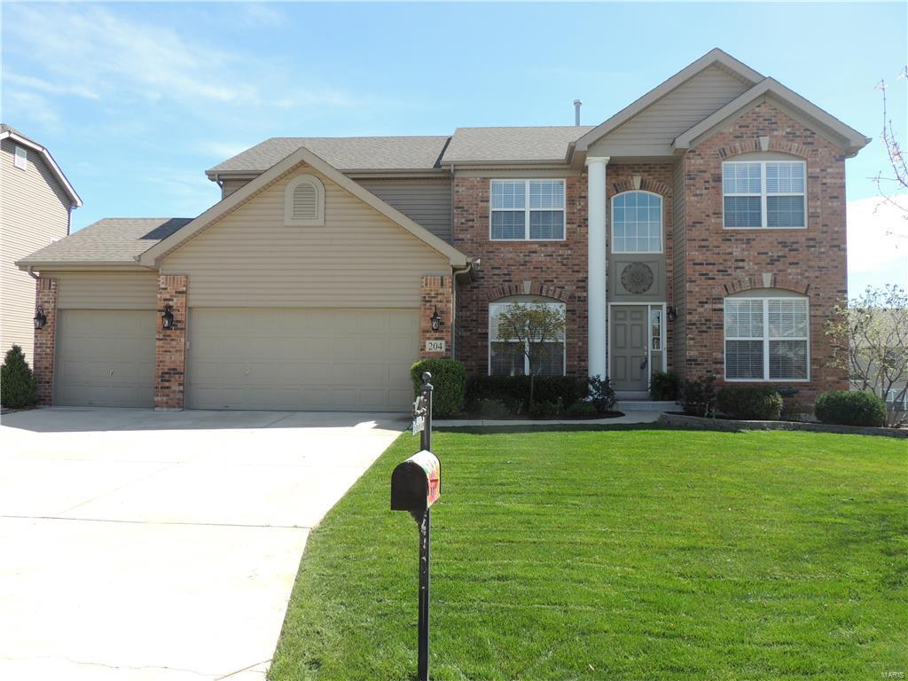 Gorgeous executive 2 story home situated on a beautiful level lot on a cul de sac.The 2 story foyer has beautiful wood floors & is flanked by a formal living & dining rm both w/ large picture windows.The family rm features a large bay window, bar area w/granite & a gas fireplace w/ marble hearth.The gourmet kitchen has 42”custom cabinets, granite, island, butler pantry, modern lighting, SS appls, beautiful wood flrs & breakfast rm w/ bay window & door leading out to a large maintenance free deck perfect for entertaining.Up the open spindled staircase you will find French doors leading to a master suite w/vaulted ceilings, sitting area, ceiling fan, his & hers walk in closets. The luxury bath has a double bowl vanity, walk in glass shower & soaking tub.There are 3 addl bedrms & a full bath on the upper level.The prof fin LL has an amazing rec rm w/stone wall accents, a custom bar w/granite & a half bath.The LL walks out to an outdoor living area w/a partially covered stone patio area.