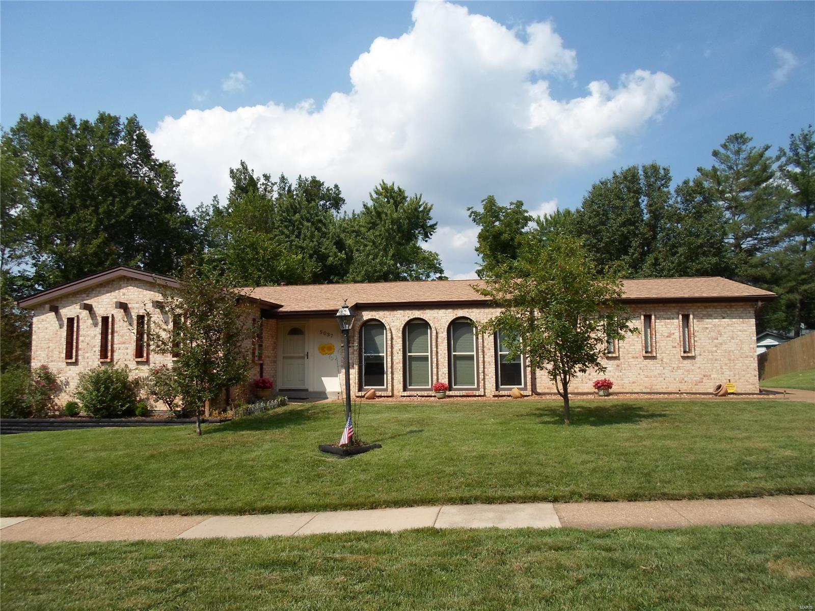 Fabulous is now ready to be your new home!! Gorgeous ranch with 3 bedrooms and 2 full baths beautifully updated.  Chef's dream kitchen with 42" cabinets, granite countertops with breakfast bar and all appliances and refrigerator to stay!  (bar stools do not stay) Huge living room and formal dining room open to kitchen and so perfect for entertaining!  You will really love and enjoy the Main floor family room with gas fireplace and gleaming wood floors.  Want some private space to enjoy coffee and enjoy the view??  Come sit in the sunroom and relax with views of the gardens and hear the birds sing, and with no neighbor on one side provides total privacy.  Large Master Bedroom has 2 double closets!! You will love the Views of the gardens from windows when you awake.  Master Bath has been beautifully updated.  Interior has been newly painted also.  Truly move-in ready!  Add huge full unfinished basement and oversized 2 car garage. Additional Rooms: Sun Room