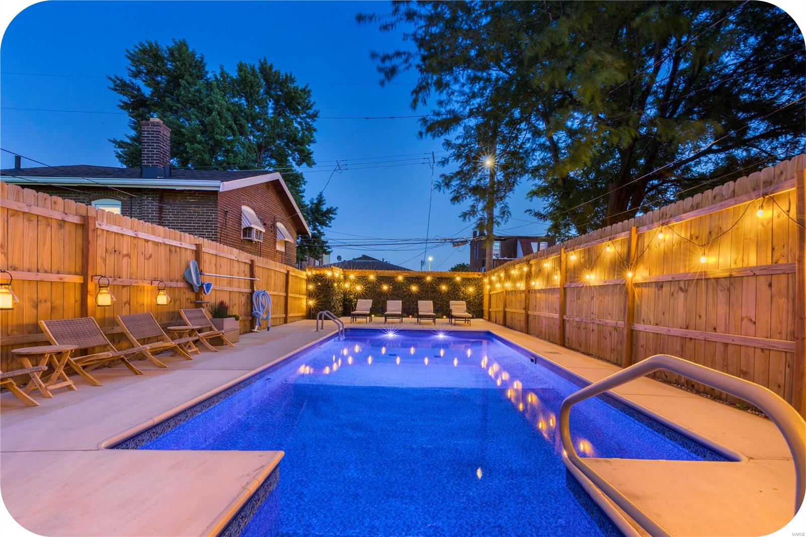 On the hunt for an urban oasis? This is the home you've been waiting for! It's already been outfitted to the nines as a furnished rental (which is included in the sale) so whether you continue using it that way or make this your forever home (or even a fun second home!)--you have lots of options here. Large living room opens up to the dining room & the kitchen is fully updated & ready for the chef of the house. The bathroom is a retreat in and of itself with its waterfall shower, soaking tub & swanky finishes. The finished lower level has another bathroom, big family room (currently set up as a yoga room), laundry, storage & even a sauna & red light therapy bed (!!). But the real piece de resistance is the HEATED in-ground pool! All this just a short walk from Food Truck Fridays, kickball, farmers markets & yoga in lovely Tower Grove Park + all the fun restaurants & bars on Morganford & Grand. Truly one-of-a-kind!