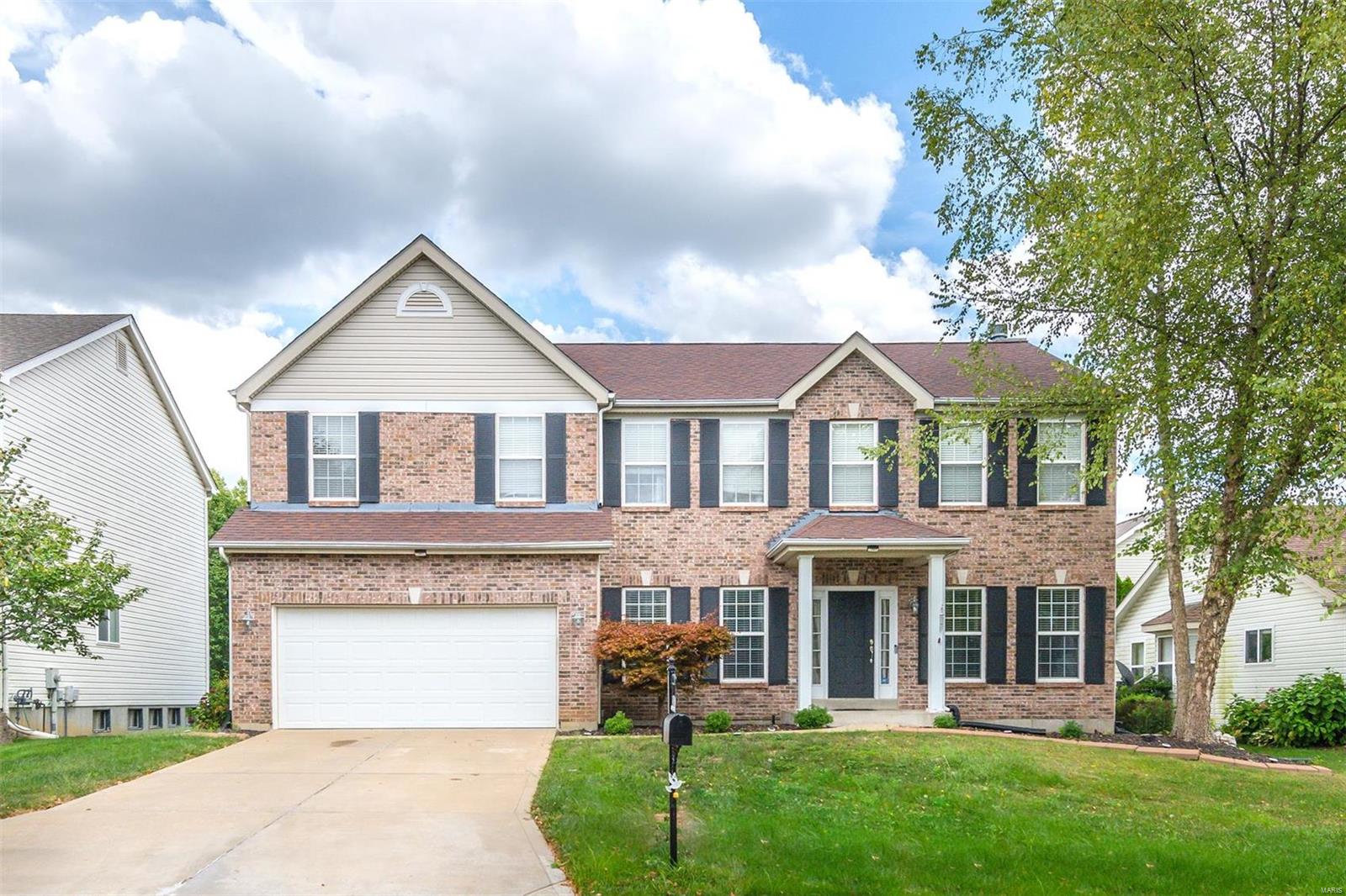 Stupendous 2-Story home boasts 4 bd, 3.5 ba, professionally landscaped in Wentzville School District! Amazing hardwood floors, welcoming entry foyer, formal dining area, new HVAC (7/2022). Work from home in large Office/Den w/convenient pocket doors for privacy. Family rm has attractive fireplace, large windows, & canned lighting. Eat-in kitchen has an abundance of custom cabinetry, quartz countertops, custom backsplash, ceramic tile flooring, SS appliances, center island/breakfast bar, large walk-in pantry, bay window & sliding glass door leads to patio area. Large main flr laundry w/built-in cabinetry & utility sink. Spacious upper-level loft for relaxing. Huge master suite w/large walk-in closet & super master ba, double vanity, soaking tub & separate shower. Mini master also along w/2 addl good sized bedrooms. Entertain in finished LL recreation rm, built-in shelves, bonus rm, & plenty of storage. Soak up the sun on patio area, BBQ on gas fire pit & enjoy fenced-in, level backyard!