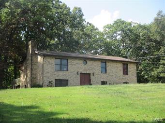 Large split foyer home with 3 sides brick in Jefferson Counties largest lake development. Large lot , access to beautiful Lake Tishomingo . Gated community. SpecialListingConditions: Foreclosure