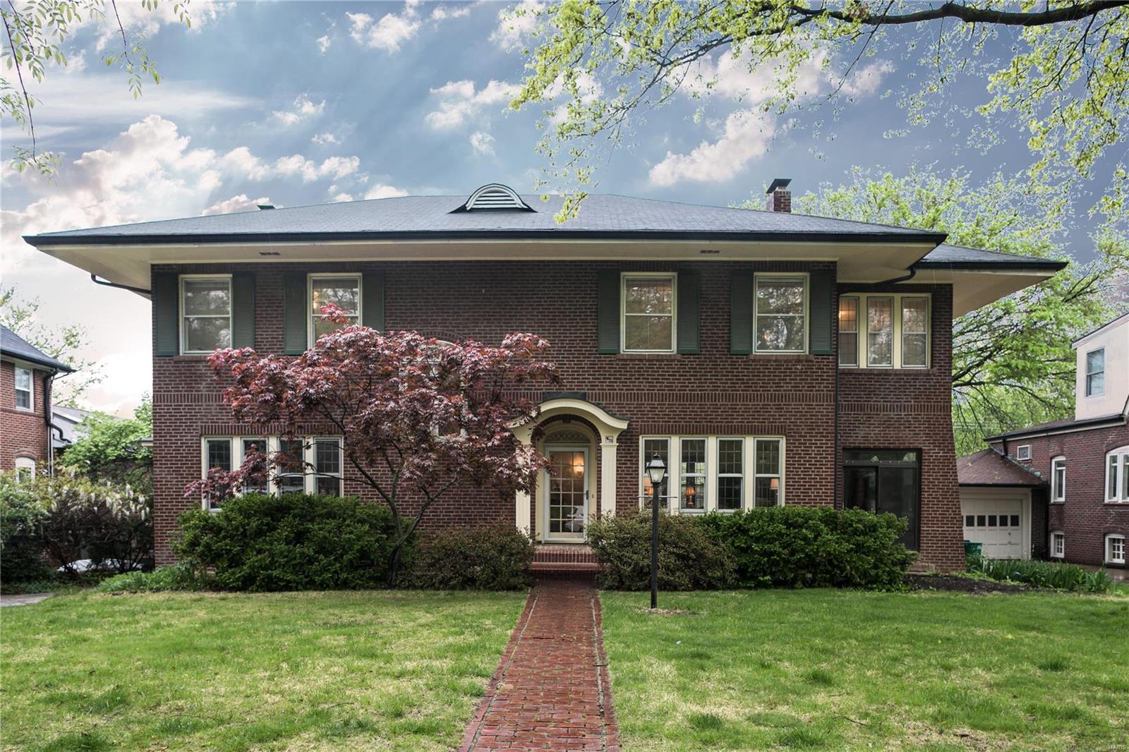 Currently the only available property for sale in Clayton's highly desirable Hillcrest neighborhood. With 3,800SF of updated, expanded space, the plan offers modern conveniences. A gracious two-story foyer detailed in marble floors and elegant crystal chandelier opens to an oversized dining room, living room, appointed in glass front built in cabinetry and classic four season sunroom. The kitchen and hearth room addition is outfitted in all-stainless and granite, breakfast bar with seating for six and butlers pantry. There is an organized mudroom and locker area as well as direct access to an expansive deck and hot tub. The second level offers a master suite addition with vaulted ceiling and sitting room, organized closets, Juliet balcony, and bath with air jet tub and separate shower. Three additional bedrooms complete the floor. Rambling yard and detached two car garage. A short walk to elementary and middle schools, Forest Park, restaurants, shopping and Wash U. Walkout basement. Additional Rooms: Sun Room