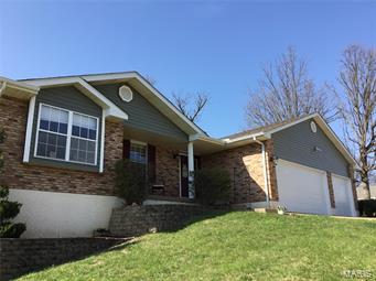 Beautiful, spacious turnkey home surrounded by privacy fence and located in a cul-de-sac. Open-concept home with updates galore! Home boasts new cape cod style vinyl siding, 30 year architectural shingle roof, new downspouts, gutters, fascia and soffits all replaced in 2017. Additional updates include: new insulated garage doors-2018, new high energy efficient 50 gallon hot water heater-2015, new Bosch dishwasher-2016 and over the range microwave-2015. The inviting hardwood front entry opens into the Great Room with a soaring cathedral ceiling. Cozy up beside the focal-point fireplace in the Great Room. The oversized Kitchen features a breakfast bar, large pantry, an abundance of cabinet space, stainless steel appliances and gleaming wood floors. Next, head to the finished lower level with Family Room, Den, Rec Room with rough in for wet bar, Bedroom, full bath, Laundry Room (gas or elec). Nestled in a quiet subdivision in the heart of Arnold close to everything!