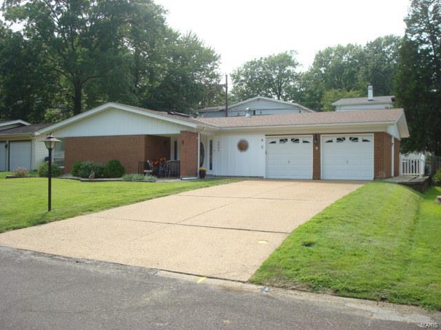 Welcome Home! This Clean, freshly painted, Well Maintained & nicely updated Ranch Home is waiting for new owners! This home offers 4 bedrooms & 2 full baths! Enter the home & find a large 9x6 entry foyer. You will find a galley style kitchen with tons of cabinet space, solid surface counter tops & all the appliances that stay! Off of the kitchen there is a breakfast room & large family room, the sliding glass door leads to the huge 33x15 covered patio a great place to entertain family & friends! You will also find a large formal living room/dining room with tons of natural light. The bedrooms are spacious & bright! The master bedroom is large with a large closet & full bath with storage shelving, you will also find French doors that lead to the Living/Dining room. Main floor laundry & the washer & dryer stay! 2 Car over sized garage with tons of storage! The yard is beautiful with nice landscaping. New A/C & furnace. Home Warranty for the buyers peace of mind! Come take a look!