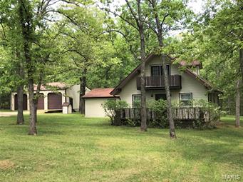Private and peaceful, 3 bed 2.5 bath home with a 20x22 m/l game room with custom built bar, water, refrigerator, & stamped concrete floor. Updated kitchen has custom Maple cabinetry, Stainless appliances new May 2018, smooth top convection oven, & pantry. Kitchen open to dining area and wood look laminate floor. Spacious living room shares Penisula, double sided fireplace
with dining area. Nice sized master bedroom has walk-in closet, full master bath with dual sink vanity. Upper level has generous guest
rooms, 1 of the guest bedroom has it's own private balcony,5x12. 3 bay insulated shop, air hose system, wood stove, heat/cool, electric. 30x40, 12’ceilings and 10'doors.