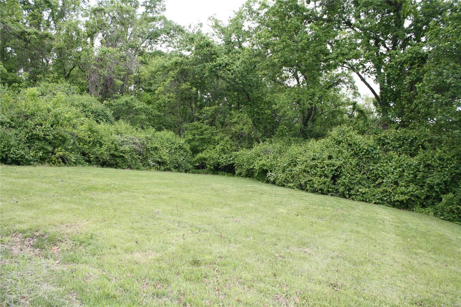Seamlessly transition from a magnificent location to a premier site for recreation! Rare find of 1.8 acre lot adjoining Old Warson Country Club that features gently rolling topography and a fringe of woods for privacy.  Vistas of the award-winning golf course make it an idyllic and rare offering in an incomparable placement off Old Warson Road.  Bring your architect, this choice property is truly a prize for the ages!