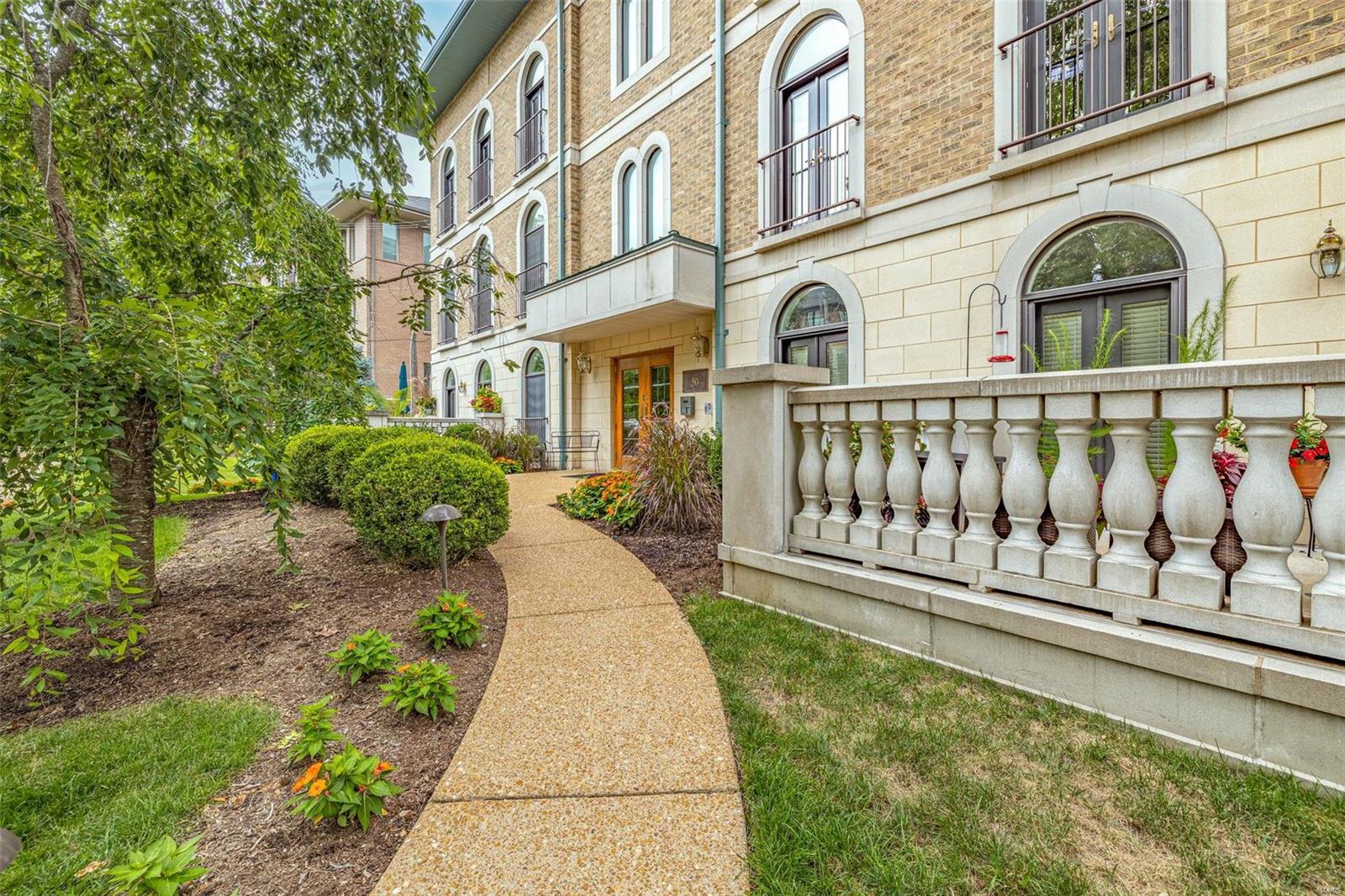 Exquisite Clayton 1.5 Story Penthouse condo! Offers fantastic flexible floor plan w/2 Master Suites!  Grand Entry w/9 Ft Clgs * Impressive Great Rm w/wood floors * Lovely Din Rm w/Gas Fireplace walks out to 1 of 3 Patios! * Handsome Office/Media Rm * Chef’s Kit w/42” Cabinetry/Granite Counters/Center Island w/Brkfst Bar/Stainless appliances (Thermidor & Wolf) * Elegant 1st Floor Master En-suite Bedroom w/walk-in shower for great 1-level living * Or head up to the gorgeous 2nd Floor Master Suite w/Sitting Rm & 22X13 private patio * It’s Spa-like bath has wlk-in shower, skylight & relaxing whirlpool tub * Plus Laundry Rm w/full-size w/d * Use either suite for in-laws, adult kids or guest visits!  New Carpet in BDRs * Secure Building w/Elevator *EZ Care lock it/leave lifestyle * Cent Vac/2020 Roof! Awesome Clayton walkability to Straubs, restaurants & Shaw Park w/outdoor pool & ice rink & newly updated Clayton Center w/Indoor Pool & 4 Gyms * No yard work/No snow shoveling * Welcome Home! Location: End Unit, Upper Level