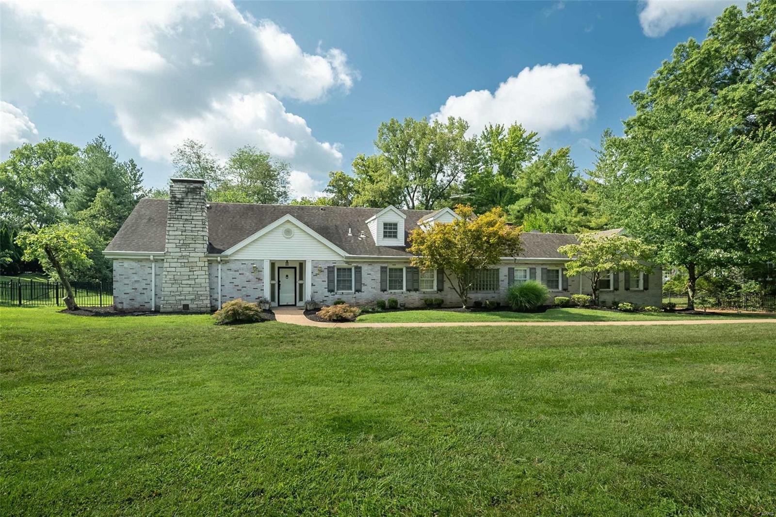 Don't miss this opportunity! Back on the market via no fault of seller! 
Welcome home to 8 West Geyer Lane. Nestled on nearly an acre of lush land in the highly sought-after Frontenac area, this beautiful 1.5-story home boasts 5 bedrooms and 4.5 bathrooms. With an open floor plan and bright, sun-filled interiors, the home offers ample square footage (5,000 sq ft) and multiple living spaces, making it ideal for both relaxation and entertaining. The open kitchen and main living areas feature wood floors and elegant bay windows, allowing natural light to flood the home. A spacious bonus room provides a flexible space perfect for an office, studio, or playroom. Enjoy the gorgeous lot, complete with a private setting and pool, perfect for outdoor gatherings or quiet relaxation. Additional Rooms: Mud Room