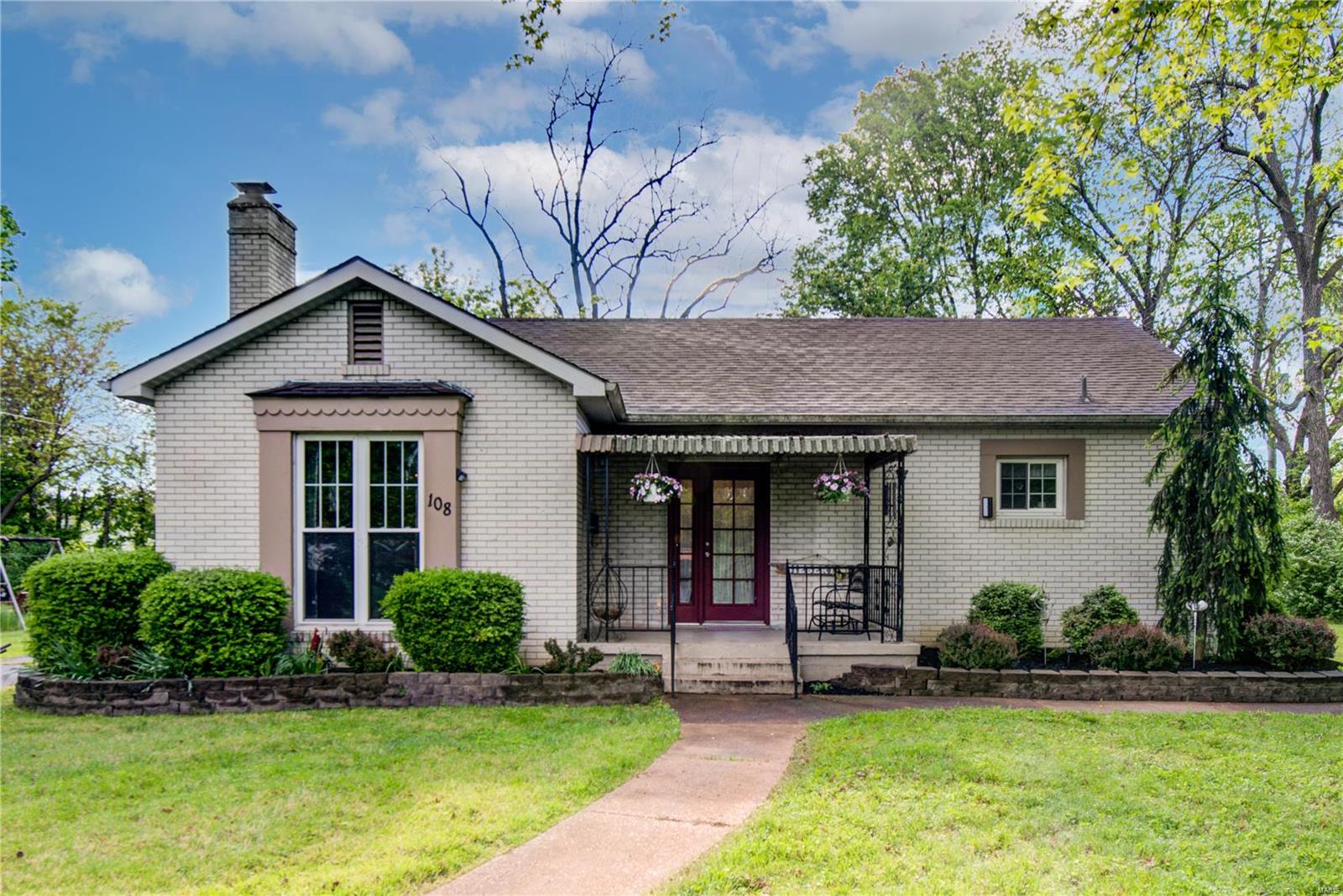 Charming cottage 2 bd/1 bath home in the heart of Crystal City. When you first pull up, you notice the curb appeal of beautiful landscaping& inviting front porch where you can sit and drink your morning coffee. You will notice a long driveway that has plenty of room for parking with a 1 car detached garage. Inside the house you will see a spacious living room that has original beautiful hardwood floors, cozy brick gas fireplace & unique hallway arch doorways. The living room opens up to the dinning & kitchen, where you can cook & enjoy open floor plan for entertaining. Two bedrooms are a good size & master has hardwood flooring too with private door entrance. Bathroom has been dazzled from top to bottom. Home offers a unfinished basement, just waiting for you to finish & make it your own. Enjoy the outdoors in a park- like setting with nice sized backyard, plenty enough for entertaining or pool someday. The yard is very private. This is a perfect starter home or downsizing for anyone.