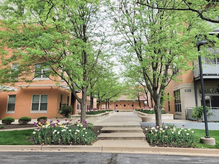 Lifestyle Opportunity at the Summit Lofts in Creve Coeur. This is a complete Package so move right in! 2 Bedrooms, 2 full baths, office/computer nook, fully equiped gourmet kitchen, (appliances are included). Private Deck from the Great room to relax outdoors.  2 Garage Parking spaces and a wonderful Club House and fitness centerwith a  private In-ground pool for residents and guests. This is a fabulous location with highway, restaurant and shopping access. There is a nice size storage closet in the hallway marked with the unit #. A trash closet with the shoot for you waste bags.  Mailboxes are on the Lower Level marked with the unit number. Elevator building so you don't have to go out in the weather.! Location: End Unit, Ground Level