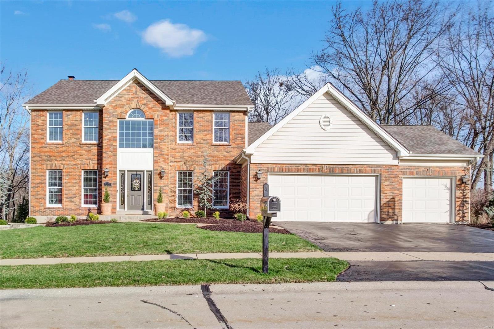 Outstanding Two-Story with 3 levels of finished living space in desirable Tall Oaks! Hardwood floors in the 2-story foyer, Dining room and Kitchen. Custom mill work: crown molding, built-in bookshelves, trim around windows/doors; Great Room w/ bay window and Gas FP; Custom kitchen remodel w/ cherry cabinetry, ctr island, granite, Stainless appliances, walk-in pantry and skylight; Vaulted Sun room with bead board ceiling & speaker system. Offers wonderful views of the wooded yard; Hardwood floors in Master Suite; Updated Master Bath features vaulted ceiling w/ skylight, heated tile floor, oversize shower, adult-height vanity w/ granite top and soaking tub. Finished walk-out LL features media area w/ surround sound, full bath and game/rec area; walk-out to the peaceful covered patio w/ ceiling fan, custom lighting, speakers and stamped/stained concrete; Nearly ½ acre park-like lot is private and beautifully landscaped. Zoned HVAC, new roof 2015. Additional Rooms: Sun Room