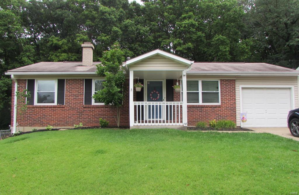 NEW PRICE TO SELL NOW!!! Move in ready!!! Your new home awaits! This 3 bedroom, 2 bath ranch is ready for its new owners. Check out the beautiful wood floors and freshly painted walls in the living room, hall, and all three bedrooms. The large eat-in kitchen boasts ceramic tile floor with plenty of cabinets and counter space, and opens to the spacious living room for an expansive gathering area. The main floor bath has a gorgeous granite counter, tub enclosure, and tile floor. The lower level provides an excellent entertaining space that features a custom tile bar and gas fireplace, full bath, and plenty of storage. Step outside to the spacious deck, patio, storage shed and, large backyard that backs to a tree-filled common ground for great privacy. Don't miss the oversized garage with door opener and work area and extra parking area. Extras include thermal windows, 6 panel doors, ceiling fans & lights, vinyl siding, enclosed soffits, and so much more!