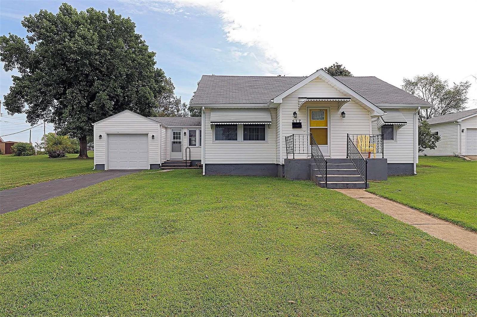 This adorable 3 bedroom home shows in immaculate condition.  You will love the custom built cabinets in the kitchen along with nice size laundry leading to ATTACHED GARAGE ! The first impression gives off a warm home feel. Enjoy the nice trim work and archways leading into formal dining and bedrooms.  Hardwood floors looks great ! This home is nestled on a double lot with a very pretty backyard.  Come take a look today ! Additional Rooms: Sun Room