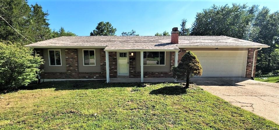 WOW, Check out this updated home backing to a tree-line.  Gorgeous finishes w/gleaming Luxury Laminate plank flooring that leads to the NEW KITCHEN w/popular cream colored soft-close cabinets, sought-after granite counters, island w/overhang breakfast bar, stainless appliances, new sink, disposal, pantry, canned lights & tile floor. Owner suite w/1 of the 3 stunning updated full bathrooms. Nice-sized secondary bedrooms w/overhead lighting. finished walk-out lower level w/2 rec areas, marble surround for your cozy electric fireplace insert, 2 more rooms which could be the 4th bedroom, guest room or den/office. Lower patio & upper deck from the kitchen both look out to the spacious big backyard. Tons of updates from top to bottom; roof, the lighting, plumbing, electric, house systems, windows, fresh paint & so much more. There is a private workshop area w/separate outside entrance & a 2 car oversized garage w/ 3 car-wide driveway. This move-in ready home won't last long, come see today!