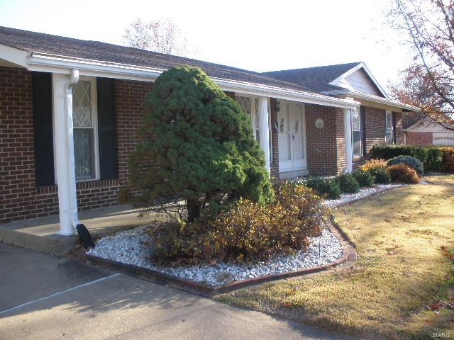 This full brick home has 3 bedrooms & 2 full baths. The home is on a corner lot with a rear entry 2 car garage and has a 20x12 deck off the family room, great for entertaining. A welcoming foyer leads to a separate dining room and open living room into a spacious family room that features a corner brick fireplace with gas/logs and mantle. The kitchen has some updates and a built in pantry. The lower level is finished with a family room and bar, also a vent free fireplace and small office, and neutral carpeting. Lots of storage area and a work bench area. Newer Hot Water Heater and Windows. Seller is offering AHS Home warranty.