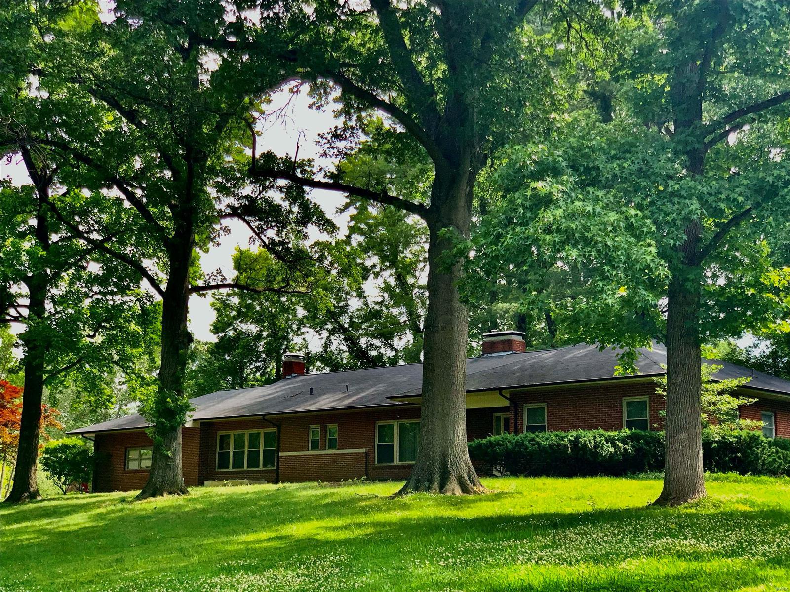 Attention Builders and Rehabbers.  Here is your opportunity to secure a .63 acre corner lot in Joseph Harding Estates to build a spectacular new home or rehab the current traditional brick ranch to meet the needs of current buyers.  Den and hall bath can be made into master suite.  Open the back with breakfast room, kitchen and dining overlooking large patio.   Main floor has 2 bedrooms in private wing with full bath, built in cabinetry and cedar closet.  There are two bedroom and a full bath in the lower level.  Basement is mostly finished but needs updating.  MOTIVATED SELLER.  SHORT SALE.  Contract contingent on lien holder approval.  Property being sold as-is.  Seller to perform no inspections or make any repairs.  Please use Special Sale Contract with Short Sale Rider form #2176.  Payout will be 45% of lien holder approved commission.