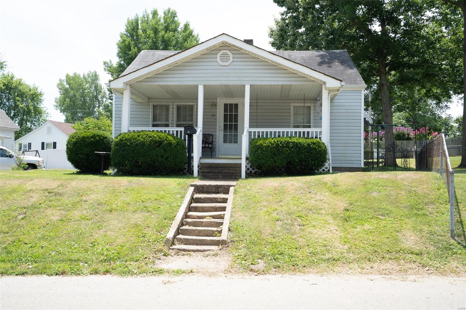 Located close to everything! Come and take a look at this charming home that is just waiting for your TLC. Easy access to attic area for storage. Located on a nice corner lot with a carport and 1 car attached garage.