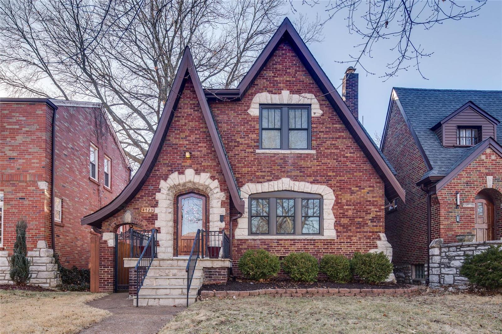 This two bedroom brick gingerbread in St. Louis Hills absolutely oozes charm! The beautiful front entry door, stained glass windows, elegant stairway, and gleaming hardwood floors are just the beginning! The home opens to a spacious sun-filled living room featuring a stunning decorative fireplace as the focal point. The large adjoining dining room is the perfect space for entertaining! The updated kitchen boasts plenty of custom cabinets, Corian counter tops, and stainless steel appliances. Just off the kitchen the sunroom leads to the patio and level backyard which is sure to be the highlight of outdoor entertaining! Upstairs the two sizable bedrooms offer more than ample closet space and an updated full bath. The dry lower level features a stunning full bath, plenty of storage and could be finished to add to the living space of this home. The two car garage and tasteful landscaping only adds to the curb appeal of this fantastic home! Close to highways, shopping and so much more! Additional Rooms: Sun Room