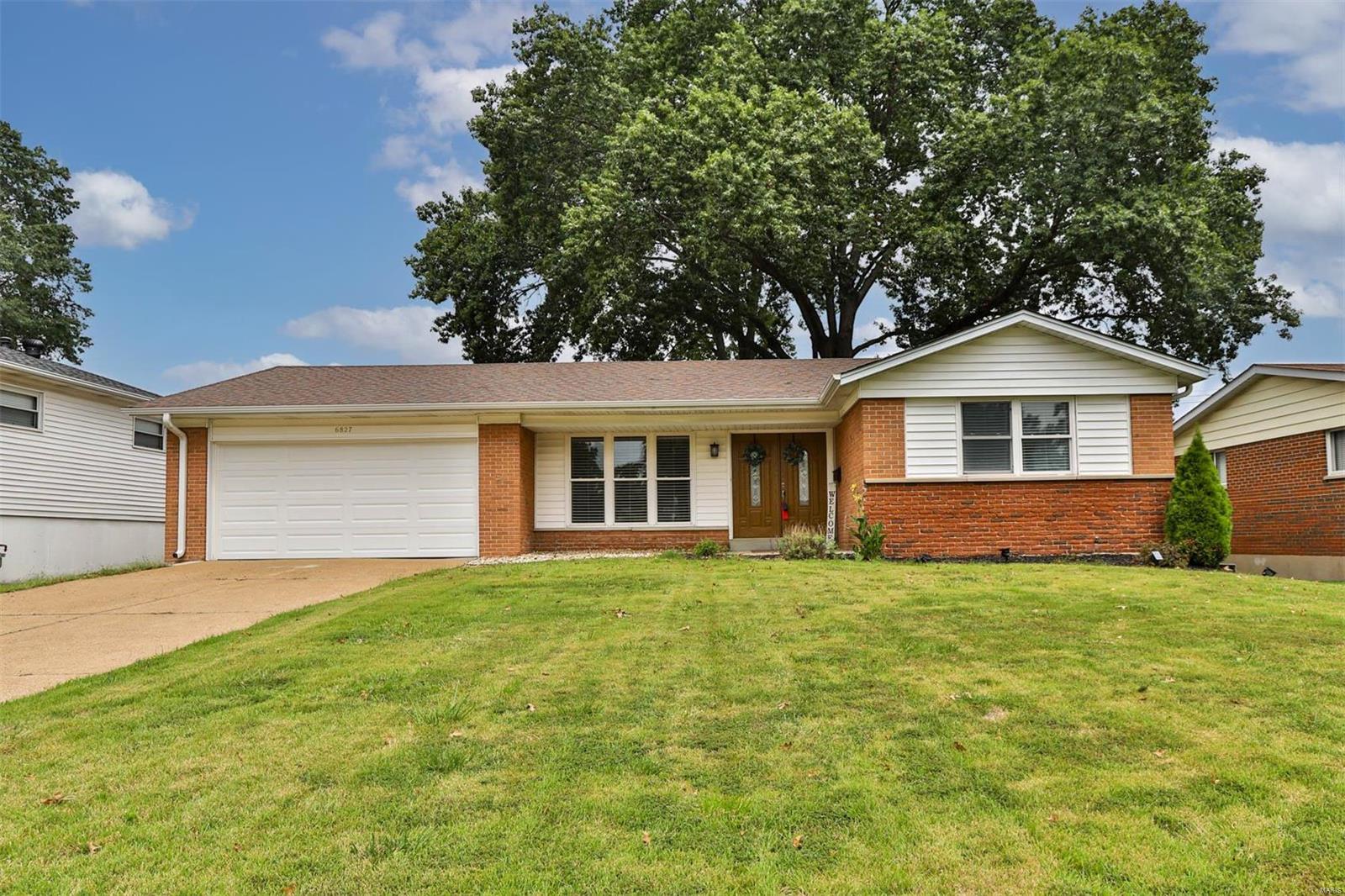 Back on Market! Full brick Affton ranch with 3 Bed, 2 Bath on main flr. Fiberglass Double Door w/ Leaded Glass! New Roof! Updated Custom Kitchen Cabinets, Solid Surface tops, Stainless Steel Appliances with new Range! Designer Tile Backsplash and extra deep Double Bowl Sink w/deluxe faucet and soap dispenser built in. Refinished Hardwood in Living room & 2 Bedrooms, Brick Fireplace in Family Rm. Ceramic Tile in Foyer, Hallway and Kitchen/Breakfast! Really nice newer Hall & Master Baths with striking Tile work! Downstairs features a Great Space for hanging out with newer carpet and 1/2 bath for extra convenience! Step outside to a 29 X 18-foot patio, level yard and gorgeous oak tree, all surrounded by a 6 ft Vinyl Privacy fence! Updates to plumbing and Electric! Newer Gas water heater, garage door and opener! Walk to Grade school, near groceries, St. Louis Bread Co.,9 Mile Brew House and easy drive to I-55 or I-44 for commutes. Come visit soon and make all of your dreams come true!