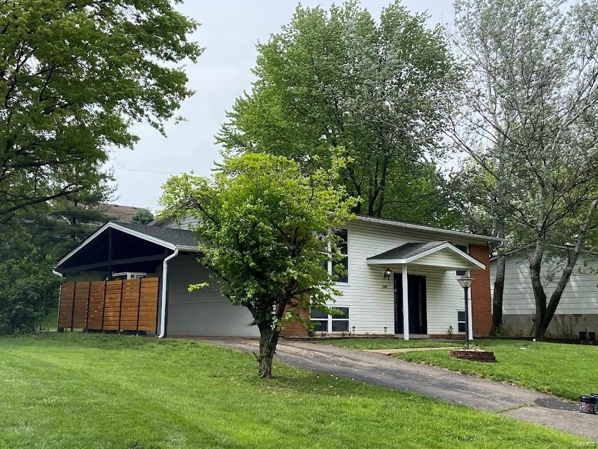 Spacious home newly renovated offers over 1,000 SF of living space - Split level home has new kitchen,2 new full bathrooms, new flooring and fresh paint throughout. Beautiful, covered porch overlooks park like backyard. Available May 1, 2024. Small dogs only allowed - no cats.