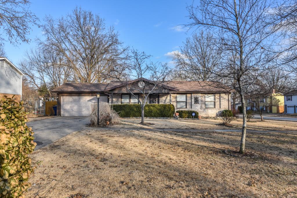 Welcome home to this full brick ranch home that offers 3 beds, 2 bath, 2 car garage, awesome long driveway, and a 19x14 deck with a hot tub included!! Enjoy the level fenced in back yard on a corner lot near the end of a quiet subdivision.  Great open floor plan that has been freshly painted on the main level a gorgeous neutral color and new carpeting to match. The large eat in kitchen offers tons of cabinetry and updated appliances. French doors lead to the back yard for easy grilling and entertaining. There is a 23X13 family room, extra sleeping room and additional storage area in the lower level.  Updated roof and HVAC system.  The 1600 sq ft of finished space does include the lower level.  Just a short walk to Sunset Park and the walking trail.  This one will be a treat to see at this price.