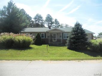 Short distance (4/10 of a mile) from town. Large eat-in kitchen with island, for the Jenn-Air cook top, and a large pantry. PLENTY of room for the family life with a walk-out basement, large deck and covered patio with privacy fence for entertaining. 2-car detached garage and work shop for the handy person!