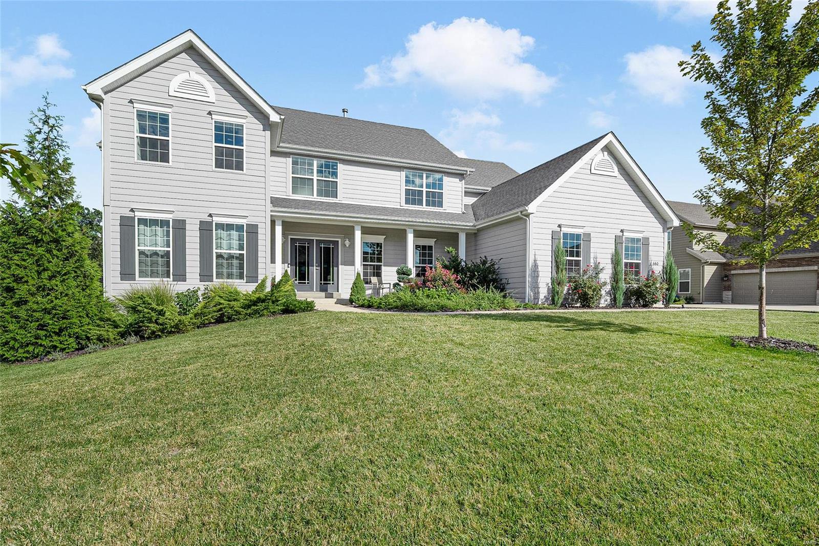 Welcome to this light-filled contemporary home enhanced by the most discerning taste. The home has been immaculately cared for & is awaiting new loving owners. Feel a sense of calm upon entering the foyer, which opens to a front office & two-story great room, featuring a gas fireplace. The fabulous eat-in kitchen boasts an induction stove, custom backsplash, peninsula island, walk-in pantry, & wine fridge, all opening to the covered deck. Adjacent to the kitchen is the hearth room w/ gas fireplace, currently utilized for additional seating, though easily converted for formal dining. In addition, the main floor hosts a catering kitchen and custom laundry area. The second floor is home to a main suite w/ tray ceilings & an expansive custom walk-in closet, an additional ensuite bedroom, plus two bedrooms sharing a jack-n-jill bath. In the lower level, you will find gathering spaces, a fitness room, fifth bedroom & full bath. All of this set on a private lot & family friendly cul-de-sac. Additional Rooms: Mud Room