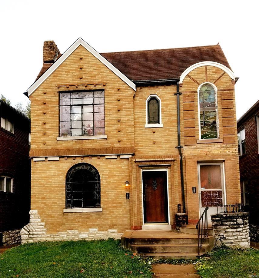 EXCELLENT opportunity for an investor!! One unit is bringing in $825 per month rental income & $103 per month for the Garage! Live in 2nd unit or RENT BOTH units for FANTASTIC Investment property!
 All-brick 2-family with completely renovated kitchen including newer cabinets, countertops, back splash, flooring and all stainless steel appliances. Hardwood floors throughout most of the home including bedrooms. Lovely arched doorways, some ceiling fans and large bay window in kitchen. Separate dining room with crown molding and decorative fireplace flanked by stained glass windows in living room. Washer/dryer hookups in basement.  Detached 2 car garage in alleyway with additional on street parking.  Located on a nice one-way street in South City.