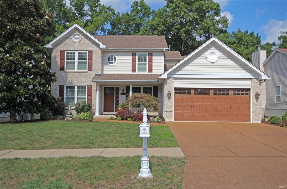 Gorgeous 1.5 story home backing to woods, on a cul-de-sac street! Inviting entry with beautiful porcelain flooring! Open floor plan! Impressive two story great room with gas fireplace and newer carpeting! Dining room! Spectacular newer kitchen with features that include custom cabinets, Cambria countertops, 2 islands, 5 burner gas cook top, built in microwave/convection oven, built in electric oven, Bosch dishwasher, porcelain flooring, & walk out to a deck! Beautifully updated half bath! Main level laundry! Main level master bedroom with plantation shutters, walk-in closet and luxury bath the jet tub & separate shower! Upper level includes a loft/sitting area & 2 additional bedrooms, all with wood flooring. Outstanding walk-out lower level includes sitting area, rec area w/wet bar, & half bath! Lower level walks out to a delightful patio & beautifully landscaped back yard. Some newer windows! Newer inground sprinkler system. One year AHS Shield Essential Home Protection Plan!