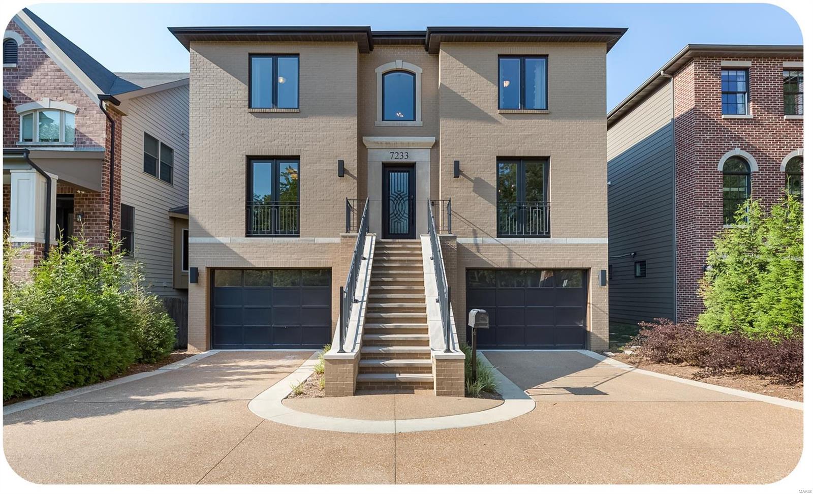 For those who aspire to the height of modern luxury living, welcome to this absolutely stunning newer construction only blocks from Clayton and Washington University. This magnificent home begins with a magnificent 2 story stairway entrance through a custom front door and into a welcoming foyer. The interior is light, open, and airy. A perfect blend of quality, design, and location; the home features marvelous craftsmanship throughout: 9 foot ceilings, crown molding, French doors with Euro styled locks, a beautiful staircase, and surround sound. The center island gourmet kitchen features marble countertops, chef inspired Viking stainless steel appliances, double ovens, 6 burner gas range, and wet bar/butler pantry with wine storage. A covered deck flows to the outside. Upstairs a beautiful master suite, as well as 2 guest rooms, an office, a full bath, and loft area. The walkout lower level features huge stone floored rec room, full bath, & oversized 2-car garage.
