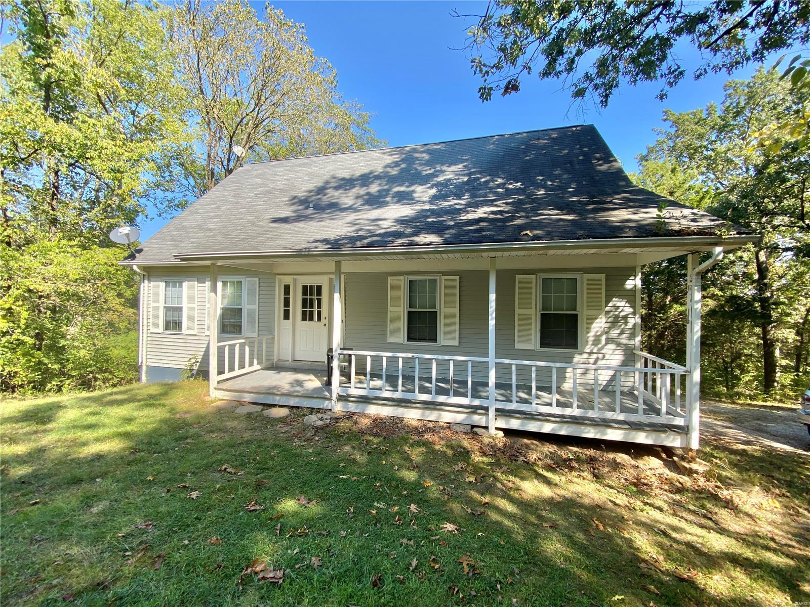 1.5 story, 3 bed, 2 bath home situated on a quiet 3.8 +/-acres.  Home backs to wooded area. Nice covered front porch to sit and enjoy your morning coffee.  Large kitchen/breakfast room with wood floors.  Main floor master suite with double vanity, large tub and separate shower.  2 nice size bedroom on the upper level.  Large deck that runs the entire length of the house.  Seller is offering a Home Warranty (see supplements). New septic will be installed.