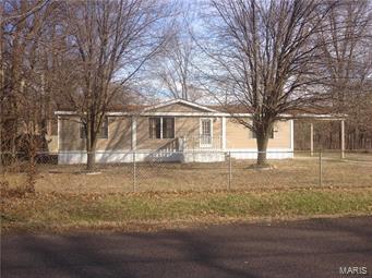 Well maintained home. New Furnace and AC units, New siding. New roof to be installed prior to closing. Separate garage with huge workshop area. Large lot for you own gardening or for the kids to play.