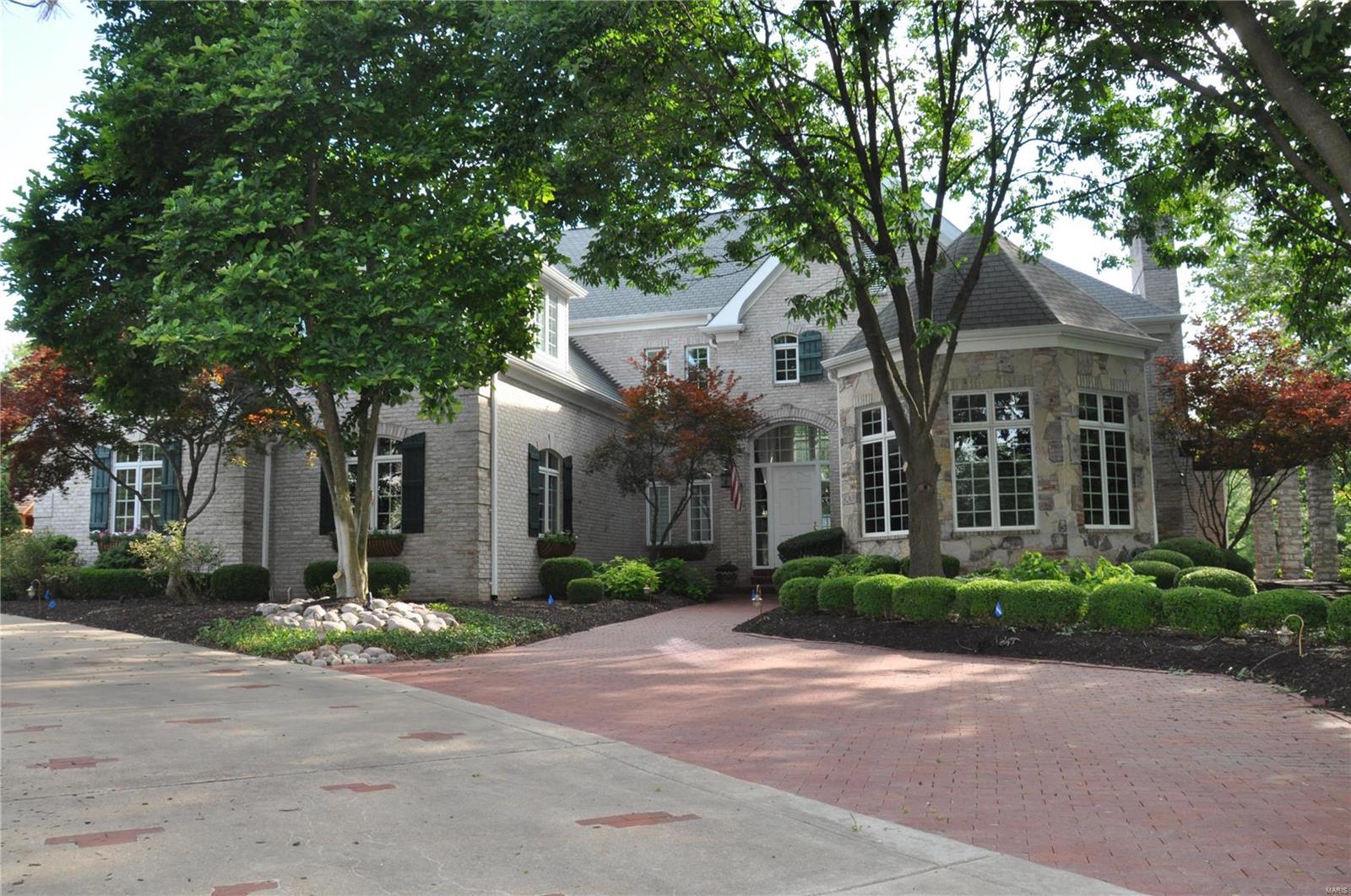 Sophisticated 1.5 story home tucked away on a cul-de-sac located in a distinguished Frontenac subdivision. Be wowed upon entry when you notice the 2-story 20 ft tall ceilings throughout the entry foyer, great room and dining room. 4 large bedrooms w/ensuites- 6 bathrooms total throughout. The basement is ready for entertainment with climate control wine cellar, tasting room, bar, movie theater, entertainment/rec area, and gym. Your own private oasis awaits with swimming pool, jacuzzi/with waterfall, pool house and outdoor built-in Viking grill. Contact us for a showing today! Additional Rooms: Wine Cellar