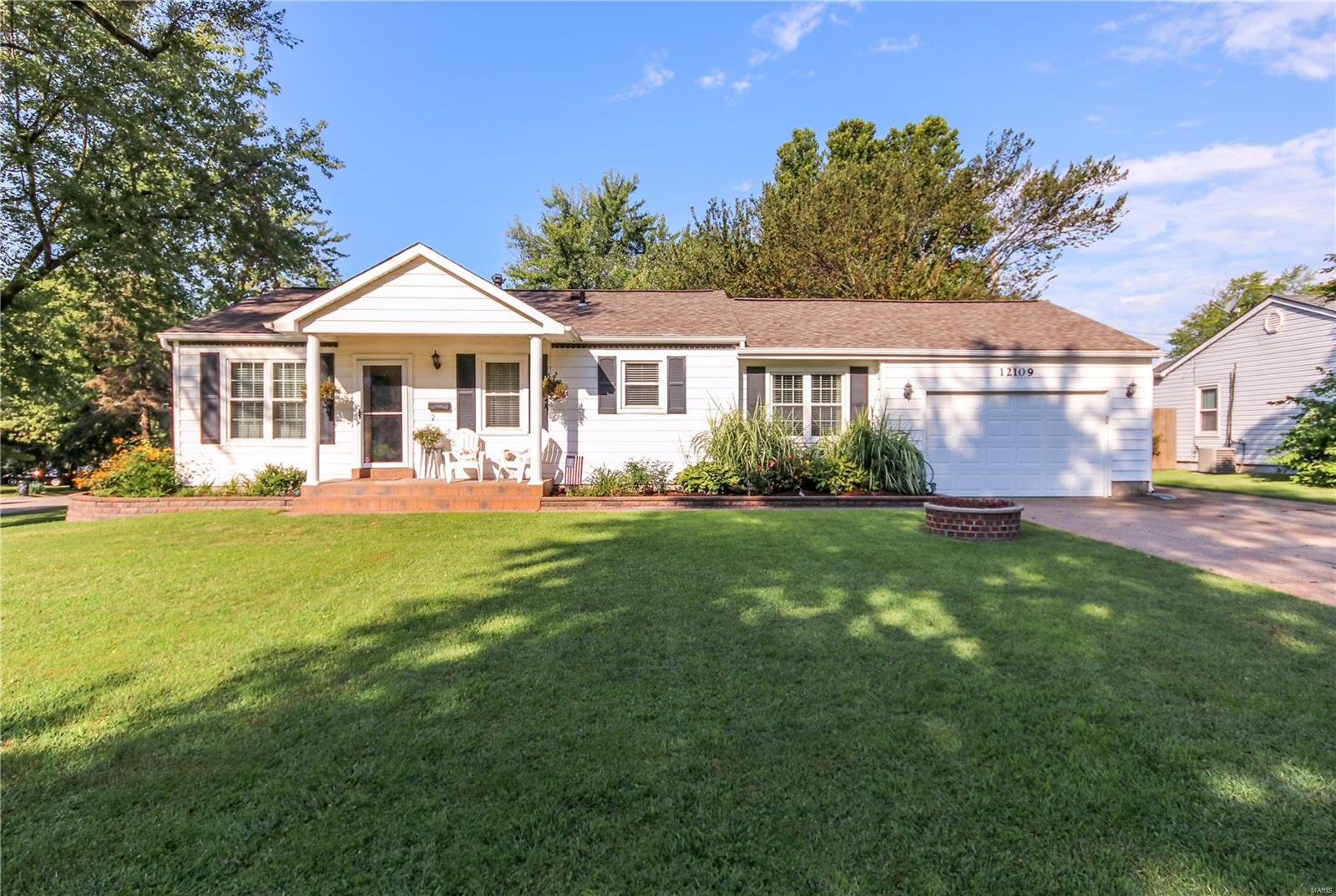 Beautiful 3 bed/1 bath ranch on corner lot.  Step inside to discover an inviting living room with Brazilian Koa floors.  Walkthrough the adjacent galley kitchen boasting custom cabinetry, updated appliances, pantry & a great view of the front yard to discover the spacious separate dining area with attached mudroom.  Check out the oversized garage w/ workbench, finished ceiling & epoxy floor.  All 3 bedrooms are located at the rear of the house alongside the full bath with the master bedroom displaying a custom closet organizer.  Backyard oasis with covered patio, red cedar privacy fence & custom landscaping.  Great space in lower level w/ separate laundry room.