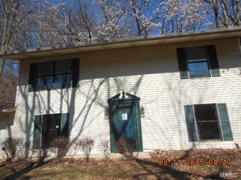 Spacious two story home built into the hillside. This house has an attached one car garage, family room with wood burning stove, and nice patio off the kitchen for entertaining. There are three bedrooms, 1.5 baths, open floor plan and more! Show and sell this unique home today! ( See comments regarding special instructions. ) SpecialListingConditions: Foreclosure